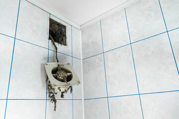 Dust, dirt, debris, and cobwebs accumulating in a ventilation grille indicate poor air quality and...