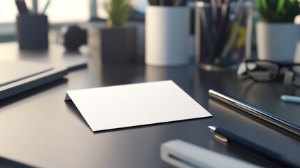 Office desk with white card, pens, glasses and stationary items in an office space