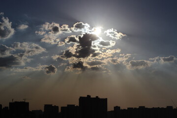 Fototapeta premium City Sunset with Dramatic Clouds