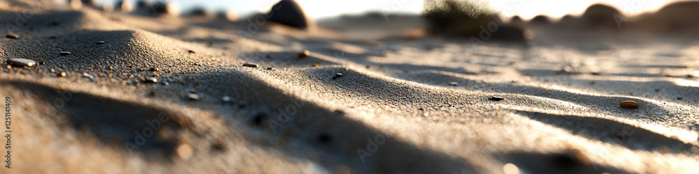Poster sand surface with pebbles and undulating texture