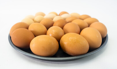 Light brown chicken eggs with slight variations
