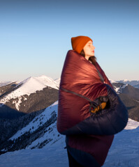 Travel concept and background. Defocused tourist on foreground and amazing snowy mountain view....