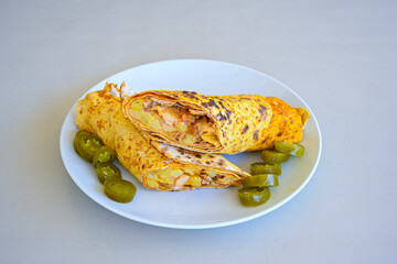 Lavash zurna doner kebab ( zurna  durum )  or shawarma sliced in plate isolated.  hatay usulu tavuk Et doner durum. Gobit ekmek arasi doner. Pilavustu iskender doner kebap. 