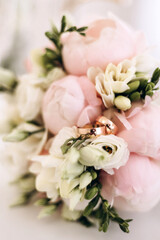 Wedding bouquet and rings