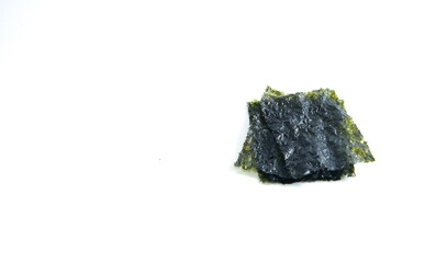 Crispy nori seaweed on white background. Tasty nori seaweed isolated on a white background. dry seaweed sheets.