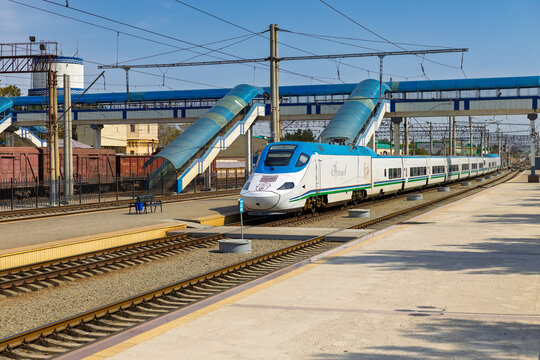 Samarkand, Uzbekistan - 3 October 2024: White locomotive of high-speed train Talgo 250 'Afrosiyob' is waiting to depart at the Samarkand railway station. Tashkent-Samarkand-Bukhara route.