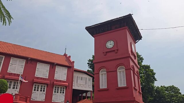 Tan Beng Swee Clock Tower and Stadthuys on Jalan Gereja Street at Dutch Square in city center of Melaka, Malaysia. Historic city of Malacca is a World Heritage Site.