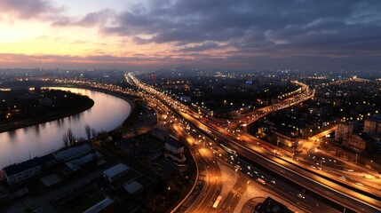Night city highway sunset river traffic aerial