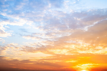 Beautiful , luxury soft gradient orange gold clouds and sunlight on the blue sky perfect for the background, take in evening,Twilight, Large size, high definition landscape photo