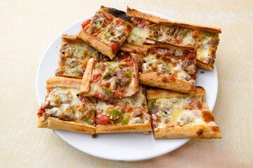 Kiymali pide.Turkish pide with minced meat. Turkish pizza mince pita Pide on white . Etli ekmek.Kusbasi kasarli, kiymali kasarli, kiymali yumurtali, Bafra, Trabzon, Kusbasili pide. Urfa acili lahmacun