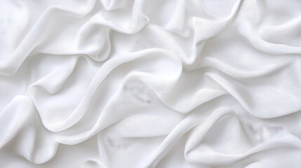 Obraz premium Soft white fabric with gentle folds and subtle texture, perfect for backgrounds