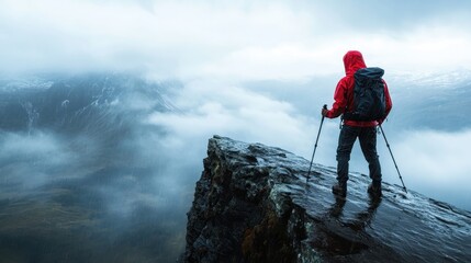 A lone hiker in a vibrant red outfit stands at the cliff edge, surrounded by swirling clouds and icy landscapes, embodying the spirit of adventure and the rawness of nature.