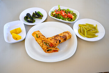 Kiymali pide.Turkish pide with minced meat. Turkish pizza mince pita Pide on white . Etli ekmek.Kusbasi kasarli, kiymali kasarli, kiymali yumurtali, Bafra, Trabzon, Kusbasili pide. Urfa acili lahmacun