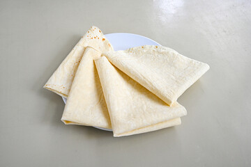 Kiymali pide.Turkish pide with minced meat. Turkish pizza mince pita Pide on white . Etli ekmek.Kusbasi kasarli, kiymali kasarli, kiymali yumurtali, Bafra, Trabzon, Kusbasili pide. Urfa acili lahmacun