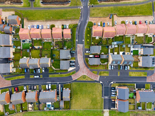 Aerial view directly above a new build housing estate in the UK