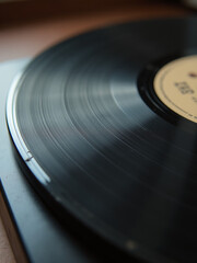 The Surface Of A Worn Old Vinyl Record Is Captured In Detail With A Macro Shot And Shallow Depth Of Field Effect. 00002