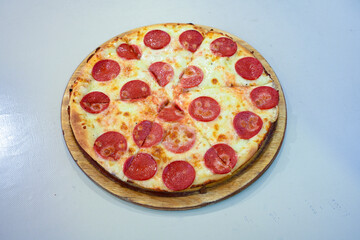 Traditional Turkish cuisine. Pizza, pita, pidesi, sucuk, hummus, kebab. Many dishes on the table. Serving dishes in restaurant. Mix, formaggi, veggie pizza. Top view, flat lay