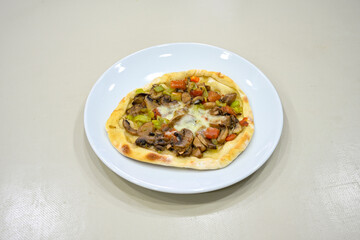 Kiymali pide.Turkish pide with minced meat. Turkish pizza mince pita Pide on white . Etli ekmek.Kusbasi kasarli, kiymali kasarli, kiymali yumurtali, Bafra, Trabzon, Kusbasili pide. Urfa acili lahmacun