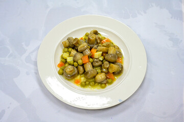 Spicy salad with mushrooms, arugula and sesame. Vegan dish. The top view