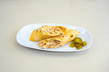 Lavash zurna doner kebab ( zurna  durum )  or shawarma sliced in plate isolated.  hatay usulu tavuk Et doner durum. Gobit ekmek arasi doner. Pilavustu iskender doner kebap. 