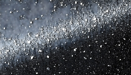 Obraz premium Transparent distressed white grainy texture with dust overlay textured. Grainy noise particles and snow effect on a black background, angled photoshot. with white shades