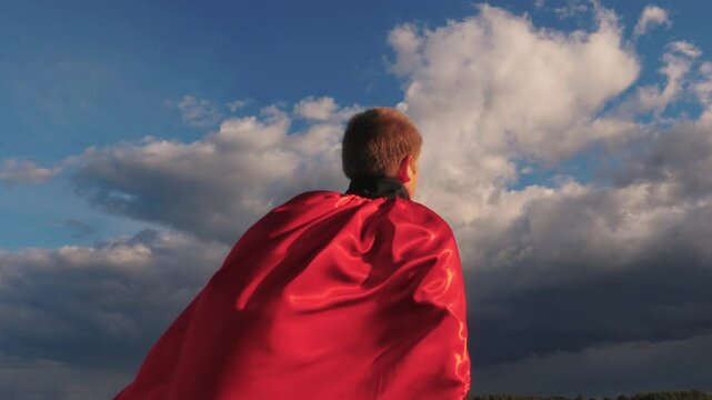 child boy son kid superhero plays park sunset red cape wind. childhood dream happy family wind. love for people, family child, joy, park sunset game, astronaut pilot flight, summer day, adventure