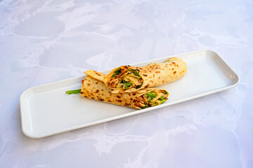 Lavash zurna doner kebab ( zurna  durum )  or shawarma sliced in plate isolated.  hatay usulu tavuk Et doner durum. Gobit ekmek arasi doner. Pilavustu iskender doner kebap. 