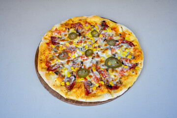 Traditional Turkish cuisine. Pizza, pita, pidesi, sucuk, hummus, kebab. Many dishes on the table. Serving dishes in restaurant. Mix, formaggi, veggie pizza. Top view, flat lay