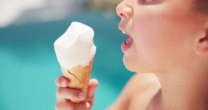 Lick, ice cream and mouth of child by pool for summer, holiday and travel in hotel for outdoor tourism. Closeup, taste and boy kid eating vanilla flavour, dessert or frozen snack on weekend vacation