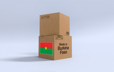 Fototapeta premium Made in Burkina Faso, Carboard carton boxes with Burkinabe flag 3D Render