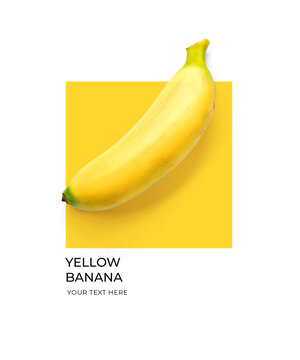 Creative layout made of yellow banana on the yellow and white background. Flat lay. Food concept. Lemon on white background.