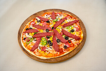 Traditional Turkish cuisine. Pizza, pita, pidesi, sucuk, hummus, kebab. Many dishes on the table. Serving dishes in restaurant. Mix, formaggi, veggie pizza. Top view, flat lay