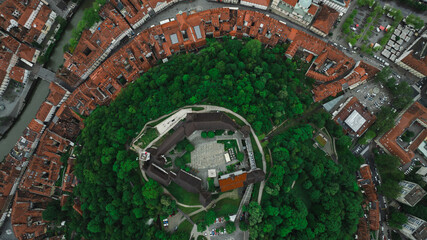 Establishing Aerial view of Ljubljana Castle on hill in historical city. Capital of Slovenia, Central Europe.