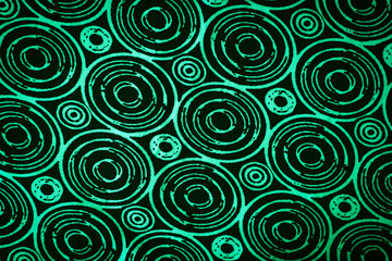 green background with circles. texture of green fabric with geometric patterns.