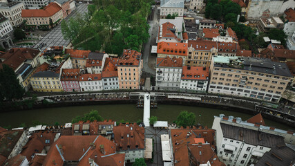 Naklejka premium Establishing Aerial view of Ljubljana Castle on hill in historical city. Capital of Slovenia, Central Europe.