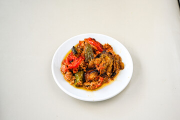 Meat with eggplant and pepper.Cooked with vegetables and hot spices. Patlican kebab, musakka.