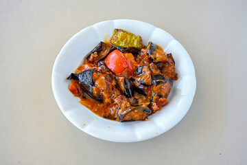 Meat with eggplant and pepper.Cooked with vegetables and hot spices. Patlican kebab, musakka.