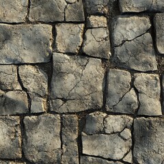 Obraz premium Here is a detailed close up view of a cracked stone wall section