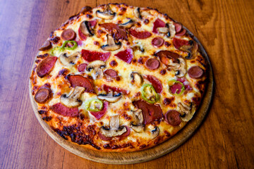 Traditional Turkish cuisine. Pizza, pita, pidesi, sucuk, hummus, kebab. Many dishes on the table. Serving dishes in restaurant. Mix, formaggi, veggie pizza. Top view, flat lay