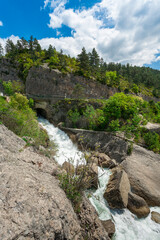The jump of Drôme, Le Claps, Luc en Diois, Drôme, southern France. Limestone rockslide eroded the bed of the Drôme.The chaotic pile of stone blocks still suggests the violence of disaster
