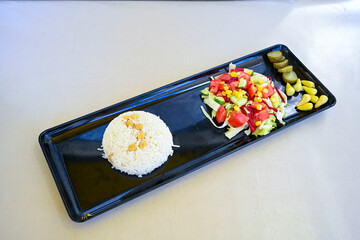 Traditional delicious Turkish food; Turkish style rice pilaf (Turkish name; Arpa sehriyeli. tavuk, kuru fasulyeli, pirinc pilavi). Cigerli, kavurmali, tereyagli nohut pilav.
