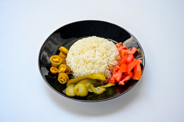 Traditional delicious Turkish food; Turkish style rice pilaf (Turkish name; Arpa sehriyeli. tavuk, kuru fasulyeli, pirinc pilavi). Cigerli, kavurmali, tereyagli nohut pilav.
