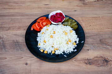 Traditional delicious Turkish food; Turkish style rice pilaf (Turkish name; Arpa sehriyeli. tavuk, kuru fasulyeli, pirinc pilavi). Cigerli, kavurmali, tereyagli nohut pilav.
