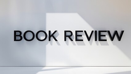 words Book Review are prominently displayed on a plain wall