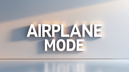 Airplane mode text casting shadows on a flat surface in a simple setting