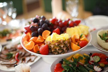 a large plate of fresh vegetable slices in a restaurant