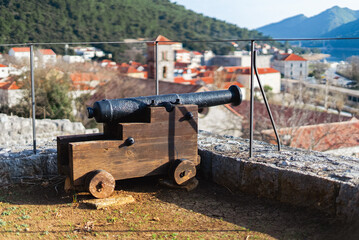 Historical cannon in the town of Ston, Croatia. Old restored fortress.