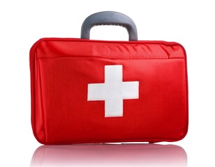 Red first aid kit with a white cross, perfect for medical or safety visuals. Compact and portable, ideal for travel, home, or outdoor use. Isolated on white background.