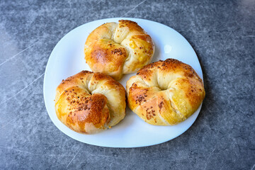 Turkish pastry product , tasty pogaca, acma . Simit, gevrek. Turkish Pastries; peynirli, patatesli, kasarli pogaca, sosili acma, dereotlu pogaca,  borek, acma, ay coregi at patisserie showcase.