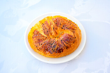 Turkish pastry product , tasty pogaca, acma . Simit, gevrek. Turkish Pastries; peynirli, patatesli, kasarli pogaca, sosili acma, dereotlu pogaca,  borek, acma, ay coregi at patisserie showcase.
